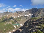 21.07.2024: Unterengadin - Blick vom Piz Clnas nach Nordwesten mit Lai da Minschun; rechts Piz Minschun